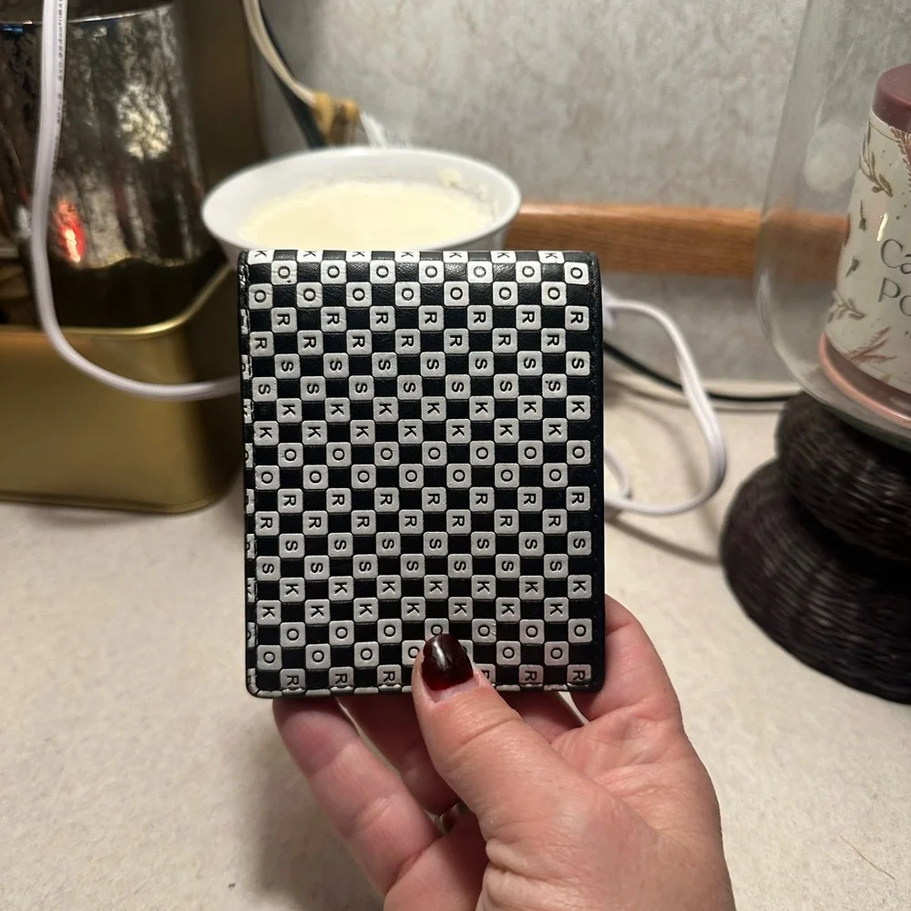 Michael Kors Cooper bilfold bifold wallet. Black and white. Used, mild wear